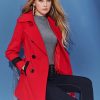Large lapel cuffs embellish trench coat